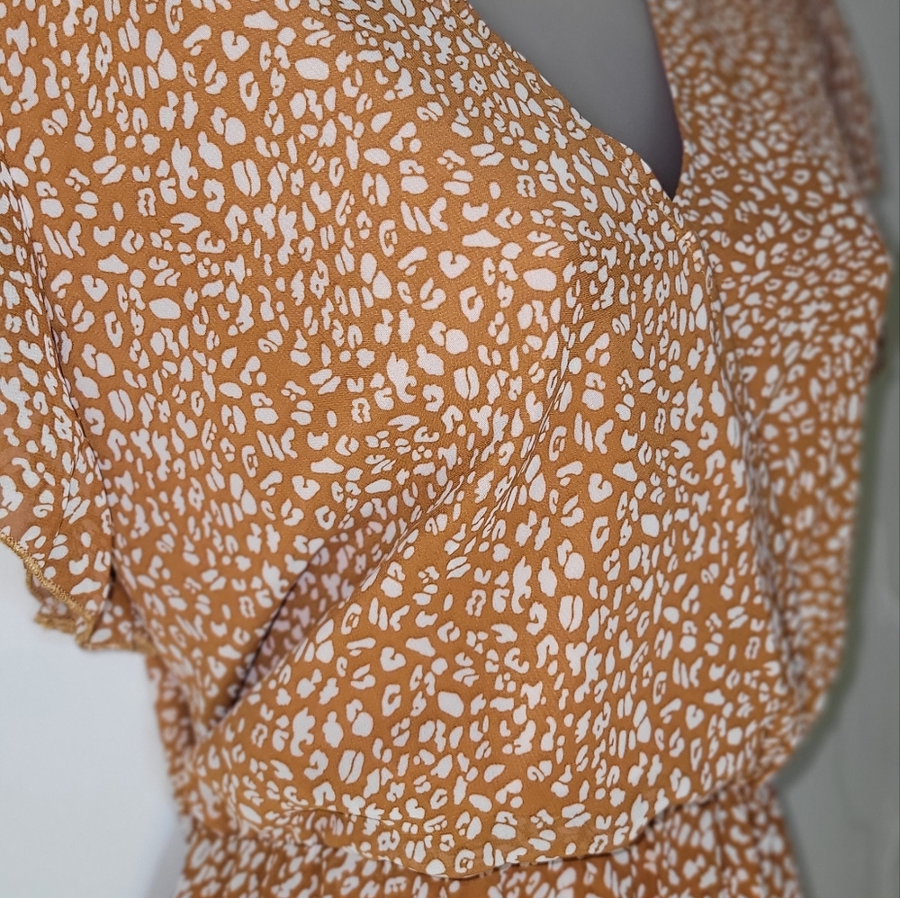 Flirty flutter sleeve dress